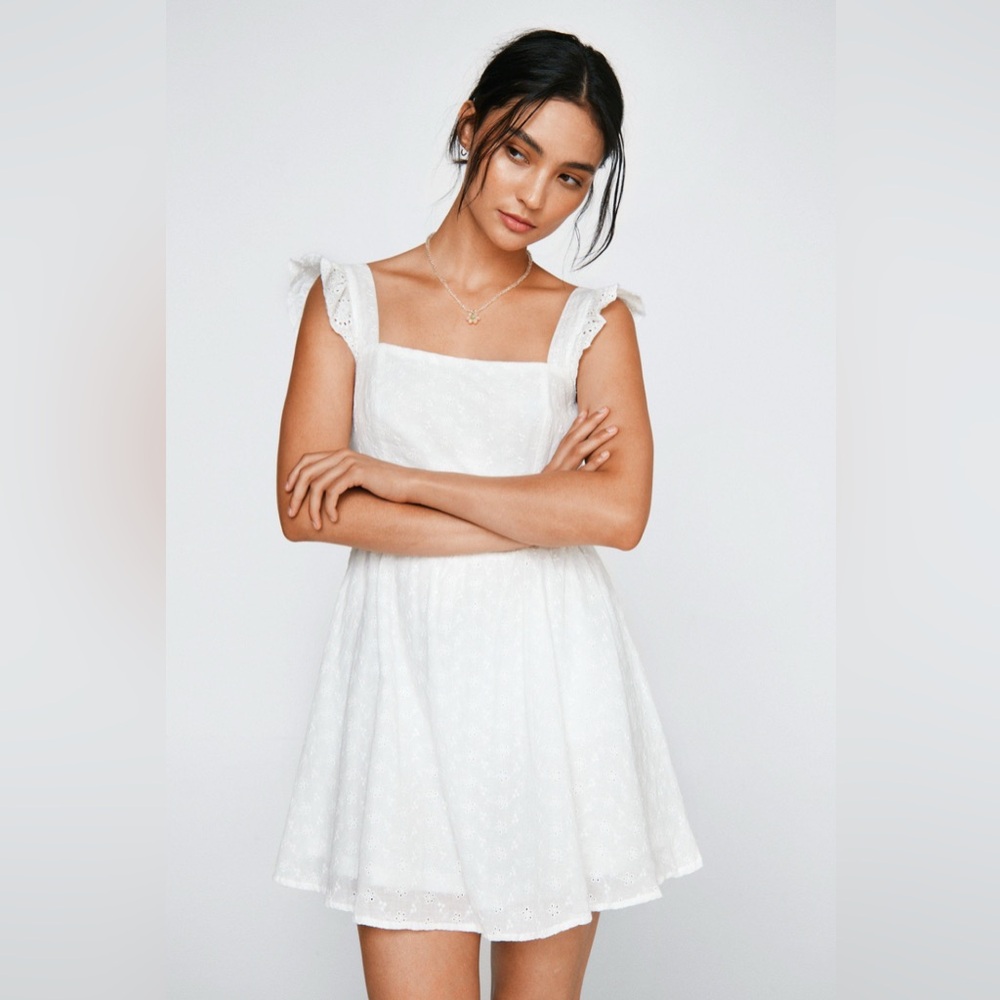 White ruffle sleeve mini dress with tie in back